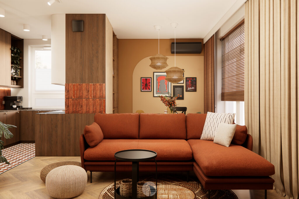 Ruda narożna sofa w salonie z plecionymi pufami, okrągłym stolikiem i widokiem na jadalnię.